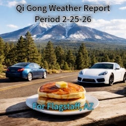 Two cars, a sedan and a sports car, parked near the San Francisco Peaks in Flagstaff with a stack of pancakes on a table in the foreground.